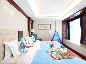 Letto o letti in una camera di Guangming CIMC Executive Hotel Shenzhen