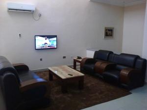O zonă de relaxare la Conference Hotel and Suites Sagamu