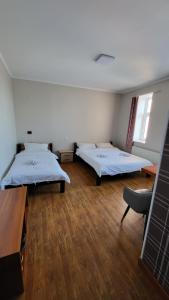 Kharkhorin hostel客房内的一张或多张床位