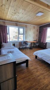 Kharkhorin hostel客房内的一张或多张床位