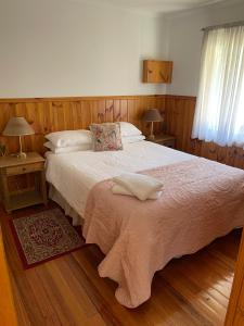 Ένα ή περισσότερα κρεβάτια σε δωμάτιο στο Monaukai Estate
