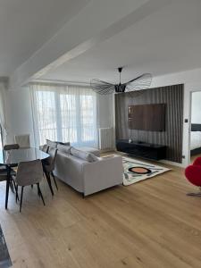 Χώρος καθιστικού στο Appartement de charme sur les toits de Boulogne !