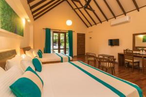 Postel nebo postele na pokoji v ubytování Yala Chalets by Lalan Leisure