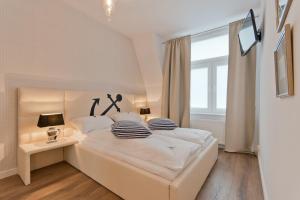 Posteľ alebo postele v izbe v ubytovaní Imperial Apartments - Molo