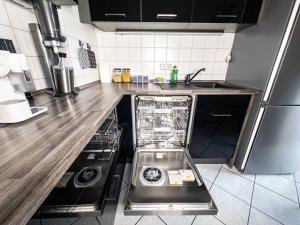 Η κουζίνα ή μικρή κουζίνα στο Erstklassige 3-Zimmer Wohnung +19 φωτογραφίες