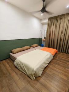 Postel nebo postele na pokoji v ubytování Wellson Home Ipoh14px 怡保中古风5间房民宿