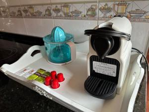a coffee maker sitting on top of a counter at Paseo Tenorio, remanso de paz con PISCINA in Ezcaray