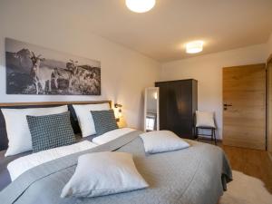 Кровать или кровати в номере Appartement Stallfeldhof