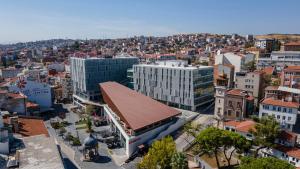 an aerial view of a city with buildings at Hilton Garden Inn Balikesir in Balıkesir