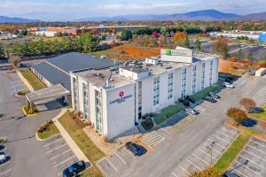 an aerial view of a building in a parking lot at Candlewood Suites - Roanoke Airport in Roanoke