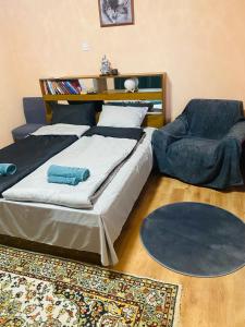 Postel nebo postele na pokoji v ubytování Апартамент за гости Байрактарова
