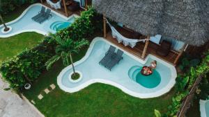 an overhead view of a resort with a swimming pool at Safaya Luxury Villas - Adults only in Nungwi