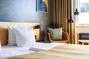Voodi või voodid majutusasutuse Fjordgaarden - Spa - Hotel - Konference toas