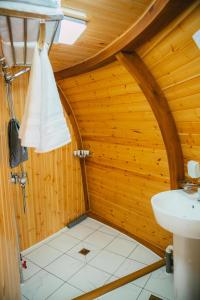 a bathroom with a toilet and a sink in a room at Glory Resort Mongolia in Nalayh