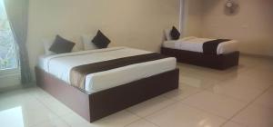 Voodi või voodid majutusasutuse CLIFFVIEW RESORT toas