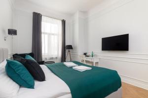Posteľ alebo postele v izbe v ubytovaní Lwowska 9 - Cozy & Comfortable Studio by Noclegi Renters