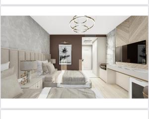 una camera con un grande letto e una televisione di Sky Hill Hotel a Ankara