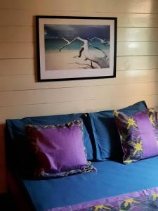 En eller flere senger på et rom på Chalets Chomoni