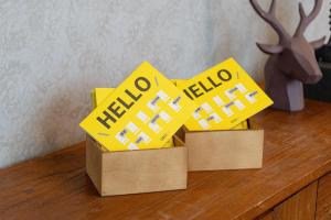 two boxes on a table with the words hello fired at CHASE Hotel in Taichung