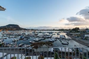 a harbor filled with lots of boats in the water at Baia Flegrea Meublè in Bacoli