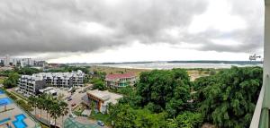 a view of a city with a river and buildings at Paragon Residences Straits View Homestay by WELCOME HOME in Johor Bahru