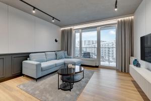 Khu vực ghế ngồi tại Downtown Apartments Seaside Przystań Letnica