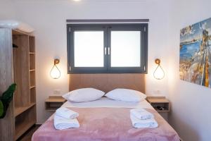 Postel nebo postele na pokoji v ubytování Serenity Luxe Suites