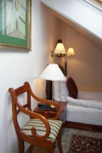 Postel nebo postele na pokoji v ubytování Hotel Phoenix