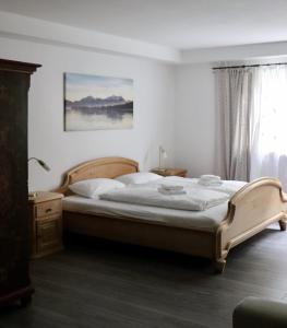 Postel nebo postele na pokoji v ubytování meywohnen Prien am Chiemsee