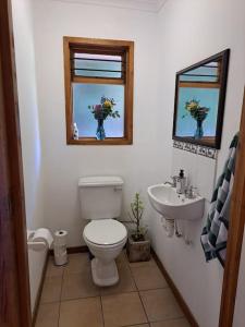 Et badeværelse på Helderberg Cottage