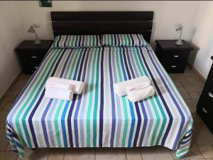 Foto dalla galleria di TRAVELLIVING - Casa Vacanze Villa Ida, Beachfront a Punta Braccetto