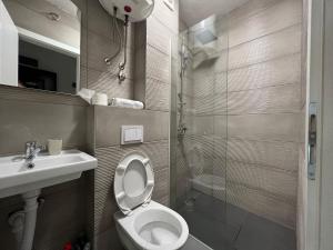 Koupelna v ubytování Deluxe NS