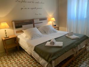 Katil atau katil-katil dalam bilik di L'Annexe Apparthôtel Porto Vecchio, 4 étoiles