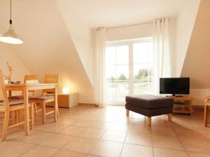 TV a/nebo společenská místnost v ubytování Barendorf Ostseeblick 03