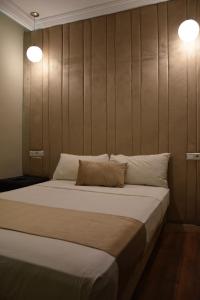 Cadé Hotel客房内的一张或多张床位