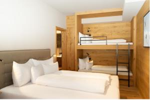 Divstāvu gulta vai divstāvu gultas numurā naktsmītnē Heimat 1495m Appartement TYP 5