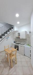 Kuchyň nebo kuchyňský kout v ubytování Stop al Duomo