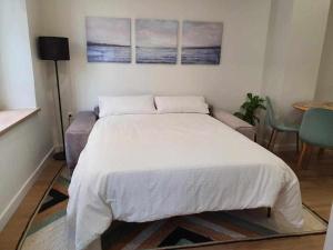 Łóżko lub łóżka w pokoju w obiekcie Apartamento Parras