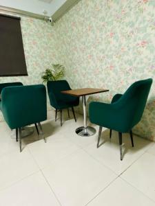 Posezení v ubytování Homestay Ac Dormitory