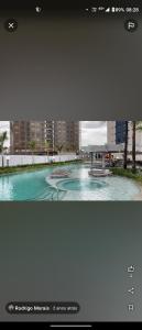 ein Bild eines Schwimmbads in einer Stadt in der Unterkunft Salinas Exclusive Resort in Salinópolis