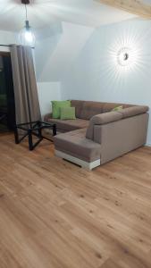 Posezení v ubytování APARTAMENTY UL.SARNIA