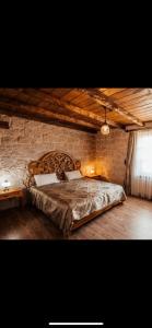 Ένα ή περισσότερα κρεβάτια σε δωμάτιο στο ELEVRES STONE HOUSE HOTEL +61 φωτογραφίες