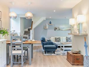 a kitchen and living room with a table and chairs at 1 Bed in Barlow 40971 in Chesterfield