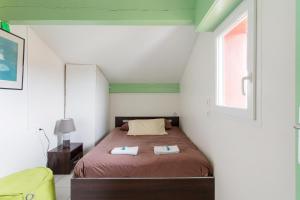 Ένα ή περισσότερα κρεβάτια σε δωμάτιο στο Bidart - balcon - Proche plage