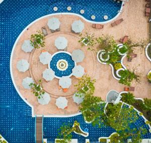 an aerial view of a resort with a pool at 普吉岛-安达曼海景度假村 PL-Andaman Seaview Resort in Karon Beach