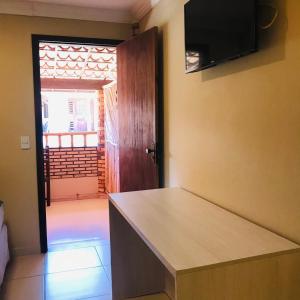 TV a/nebo společenská místnost v ubytování Hotel Pousada Latitude + 159 fotografií