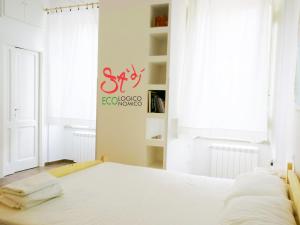Rúm í herbergi á B&b Sà Di..
