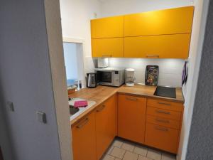 Kuchyň nebo kuchyňský kout v ubytování Ferienwohnung Else Boddenkieker