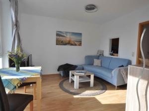 Posezení v ubytování Ferienwohnung Else Boddenkieker + 16 fotografií