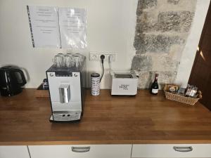 Cuisine ou kitchenette dans l'établissement Souvenirs d'hier